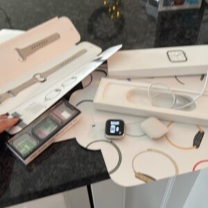 Apple Watch Series 7 starlight, with extras.  41mm cellular service optional
